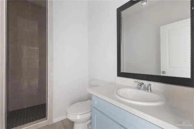 a bathroom with a sink and a toilet