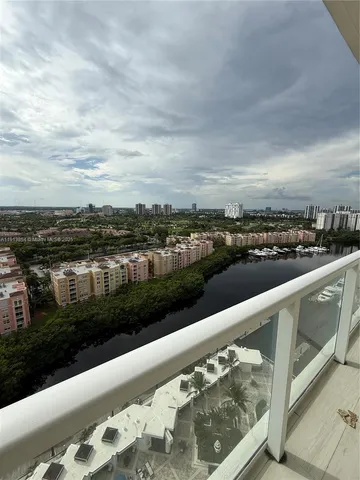 a view of living room with furniture and a fireplace