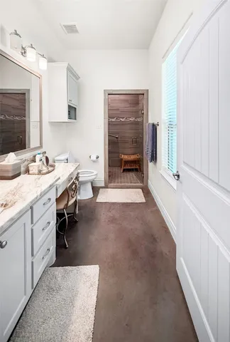 a view of a room with cabinets