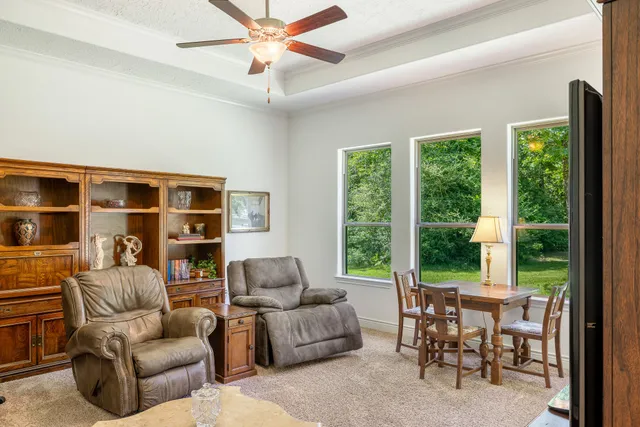 a living room with furniture and a window