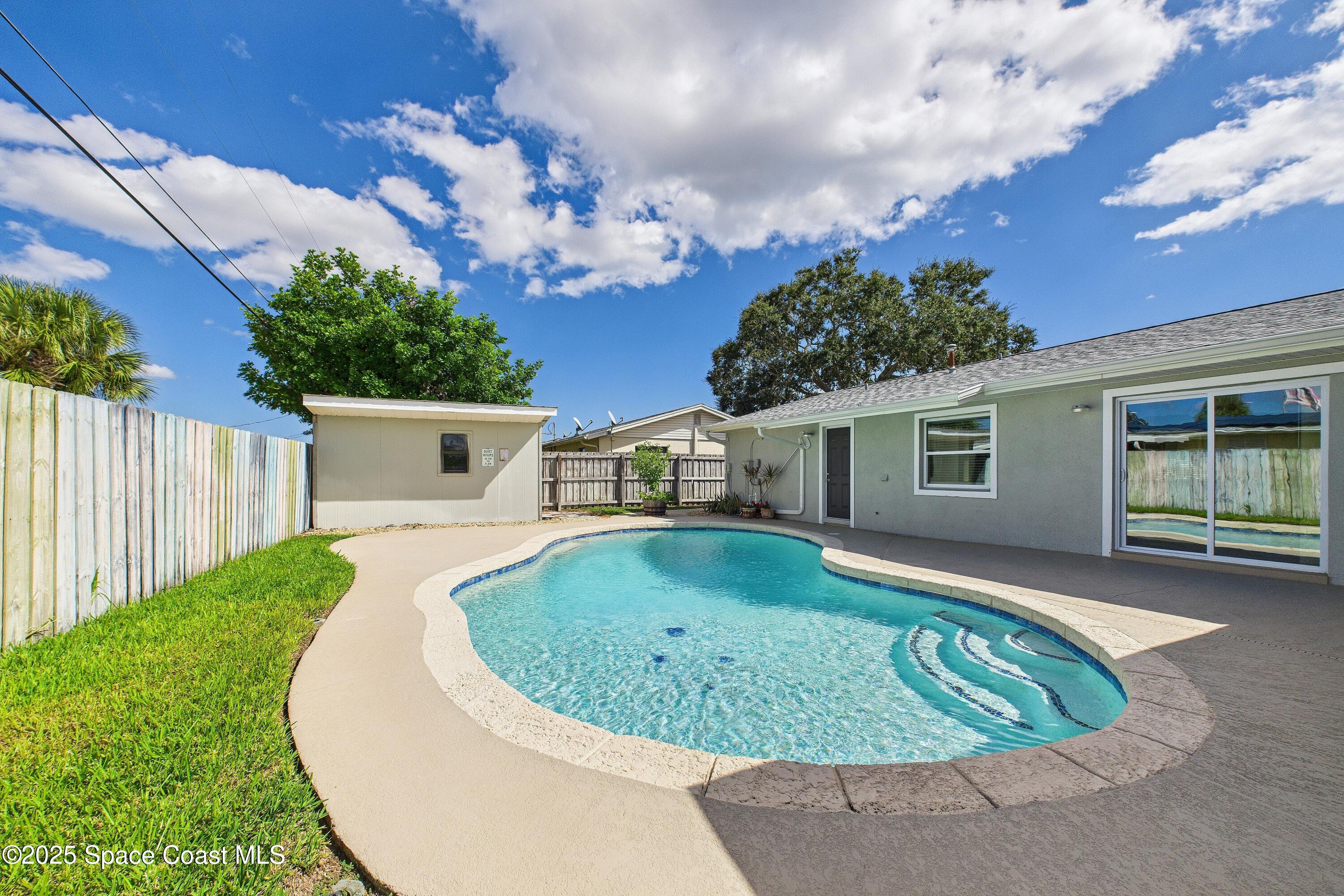 1500 Dorsal Street Merritt Island, FL 32952 - Photo 1 of 56 a view of a house with a backyard