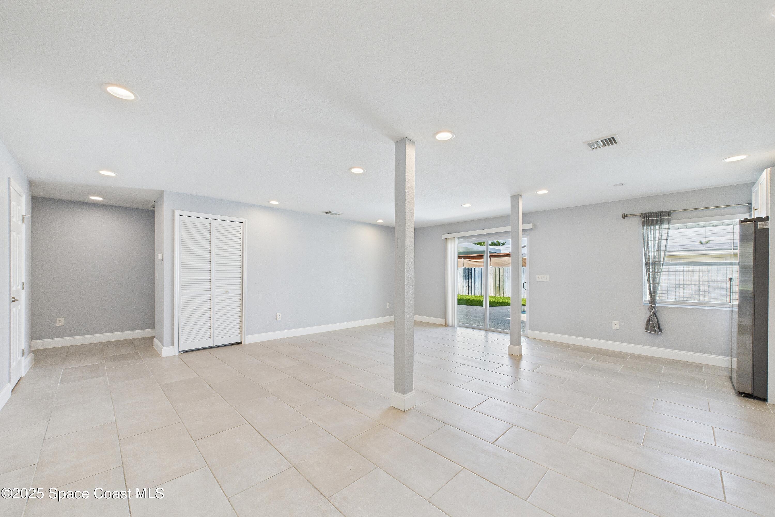 1500 Dorsal Street Merritt Island, FL 32952 - Photo 16 of 56 a view of an empty room with a window