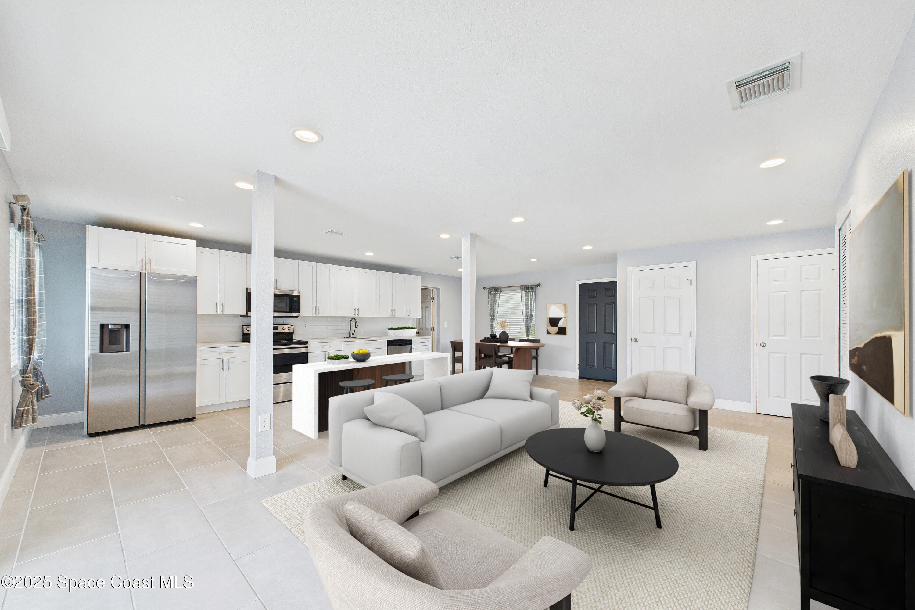 1500 Dorsal Street Merritt Island, FL 32952 - Photo 18 of 56 a living room with stainless steel appliances kitchen island granite countertop furniture and a view of kitchen