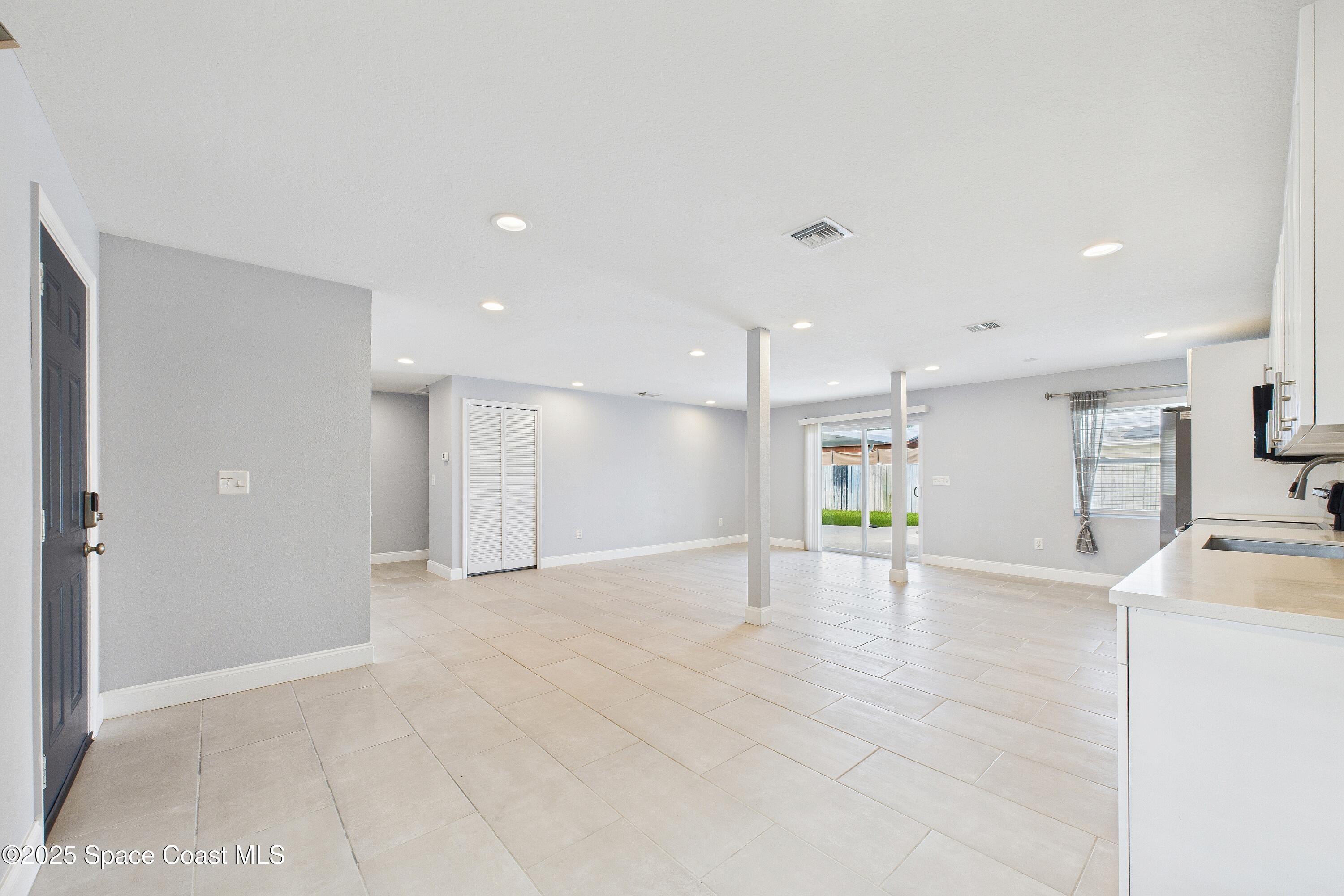 1500 Dorsal Street Merritt Island, FL 32952 - Photo 20 of 56 a view of an empty room with kitchen