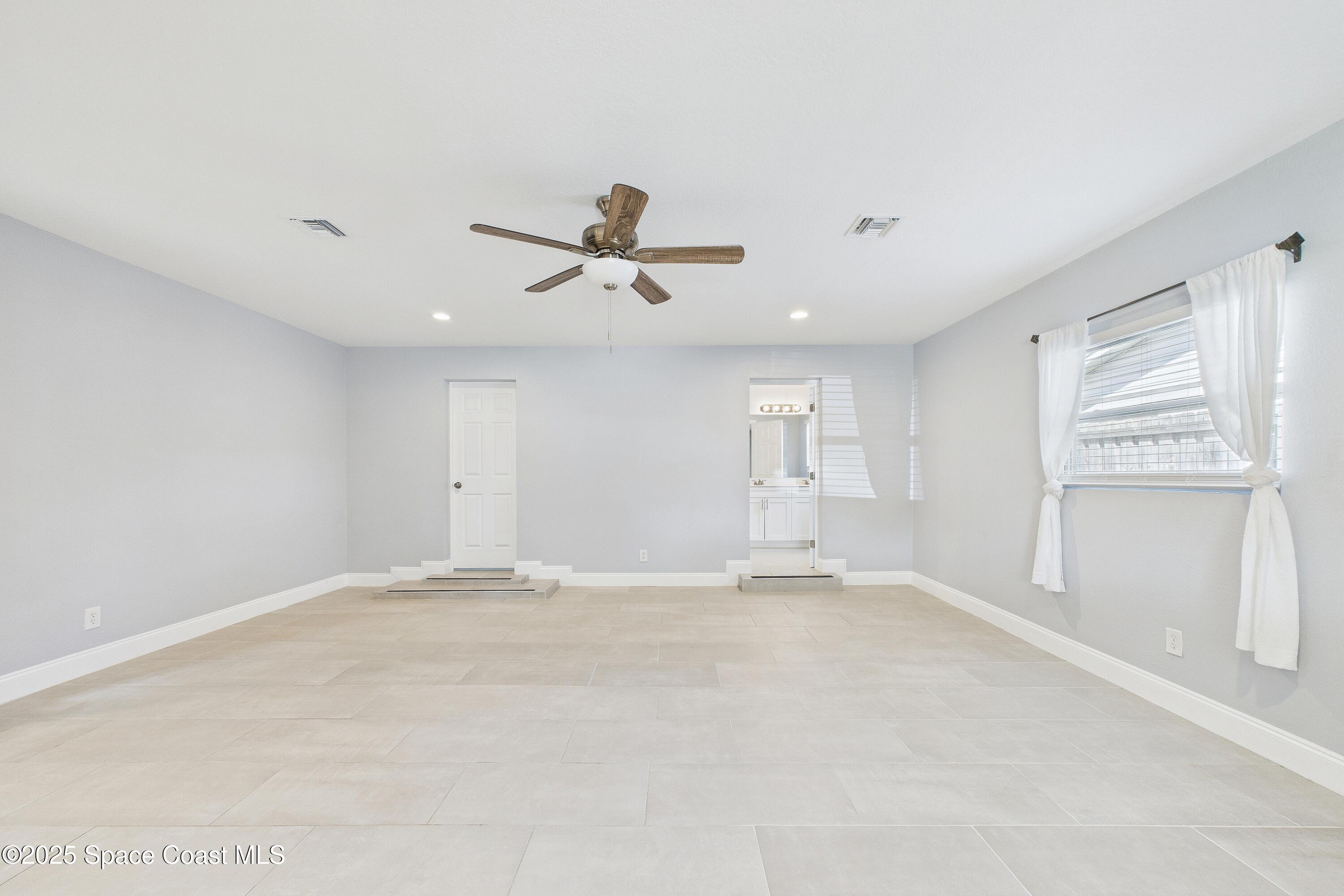 1500 Dorsal Street Merritt Island, FL 32952 - Photo 25 of 56 a view of an empty room with a window