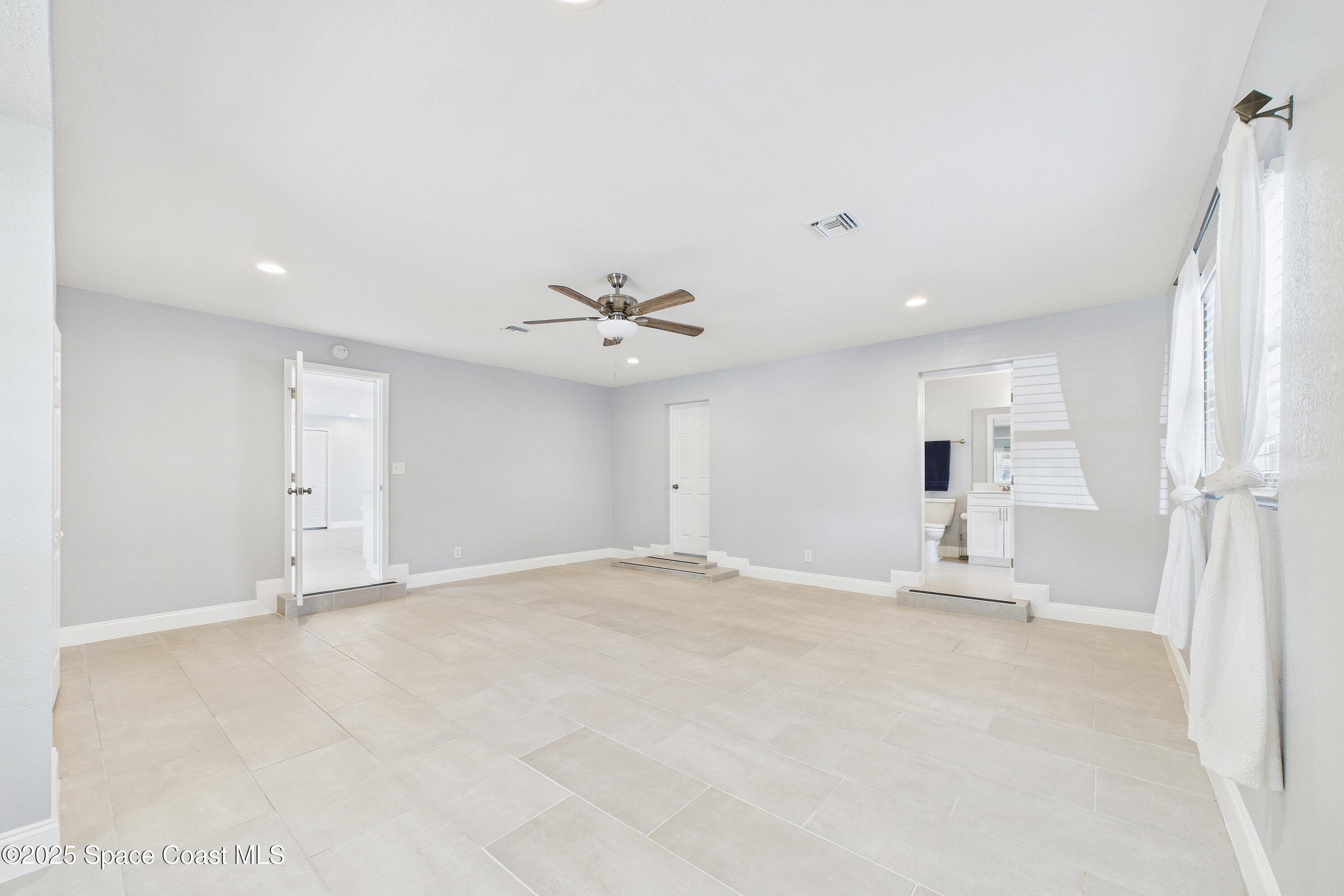 1500 Dorsal Street Merritt Island, FL 32952 - Photo 27 of 56 a view of an empty room with a window