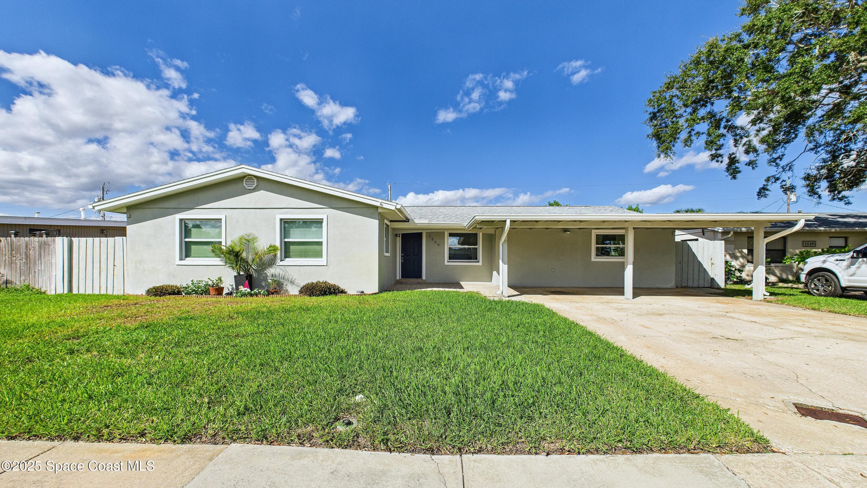 1500 Dorsal Street Merritt Island, FL 32952 - Photo 3 of 56 a view of a house with a patio