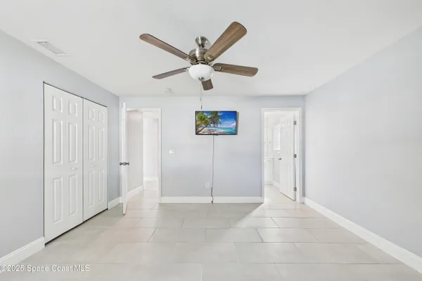 a bathroom with a toilet sink and shower