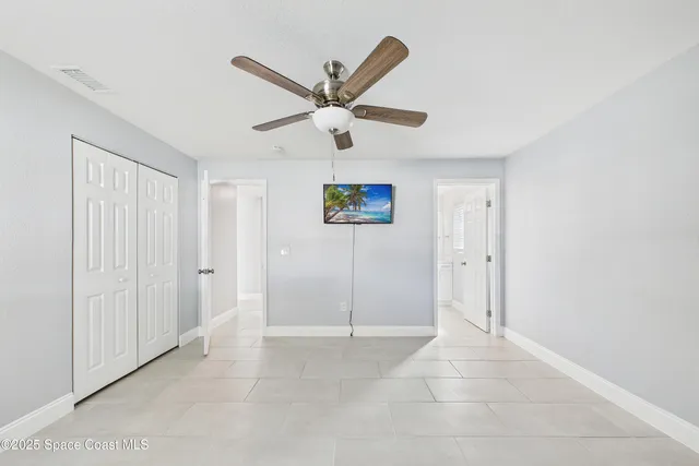a bathroom with a toilet sink and shower