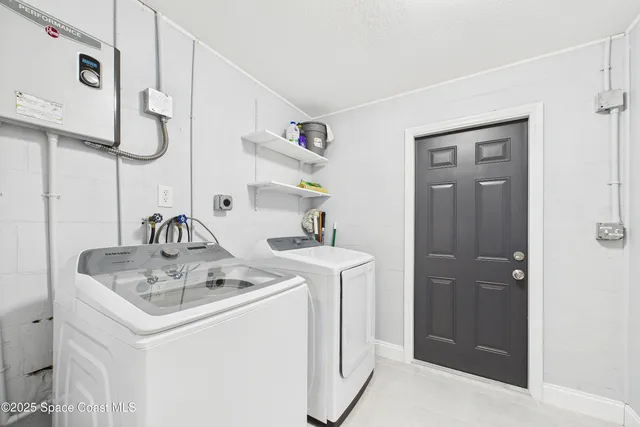 a view of a porch with a flower garden