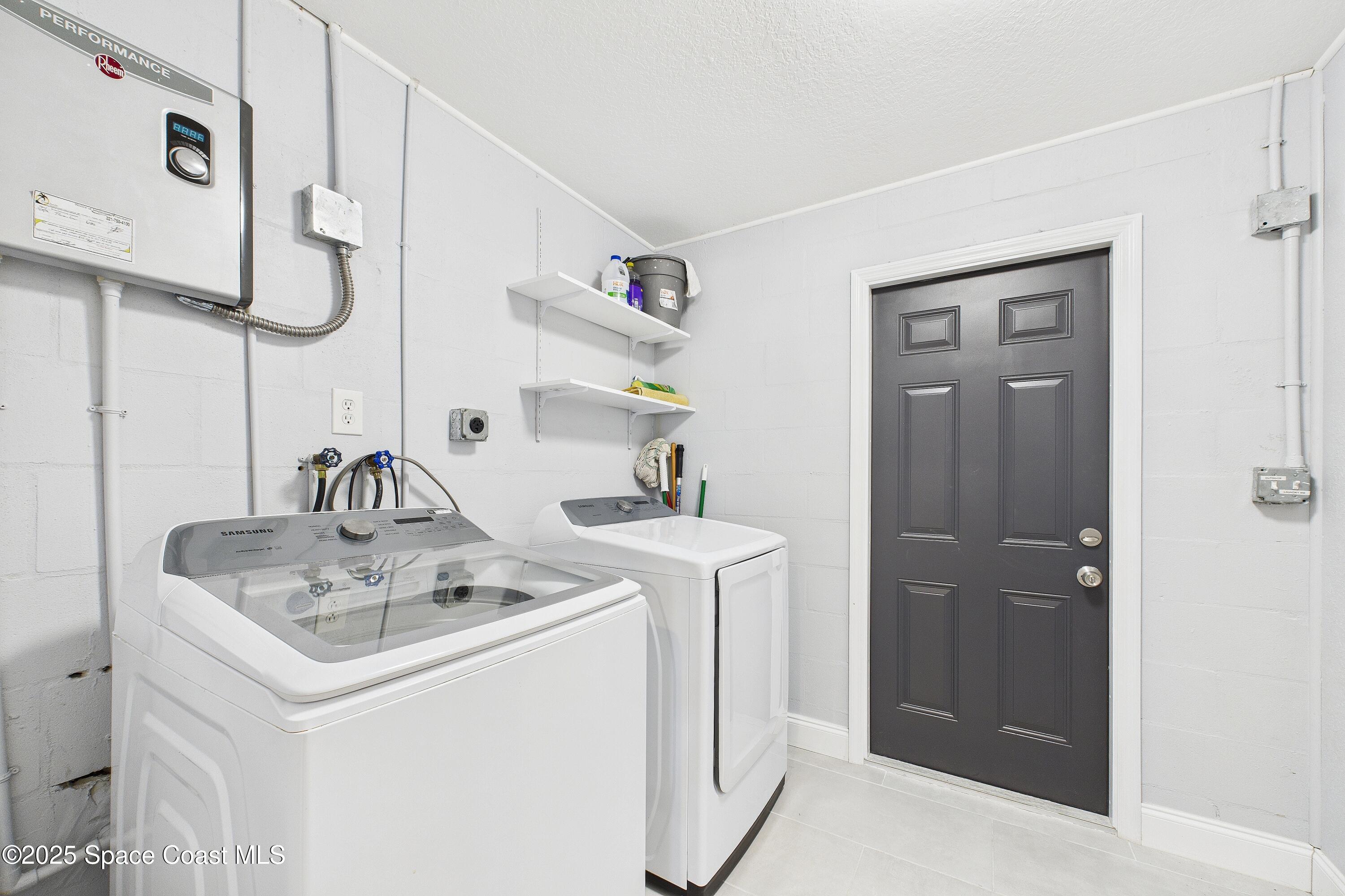 1500 Dorsal Street Merritt Island, FL 32952 - Photo 44 of 56 a utility room with dryer and washer