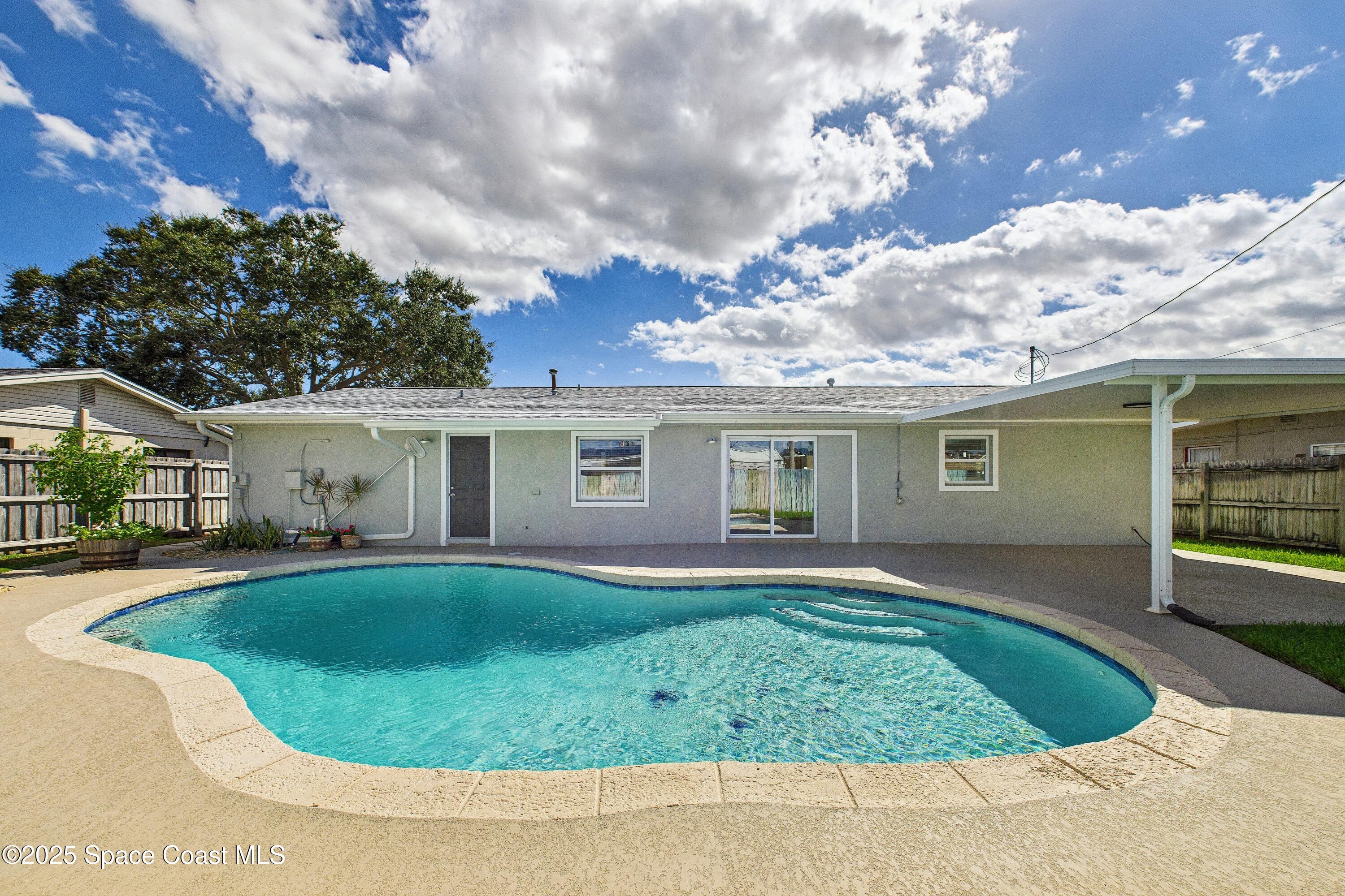 1500 Dorsal Street Merritt Island, FL 32952 - Photo 45 of 56 front view of a house with a yard