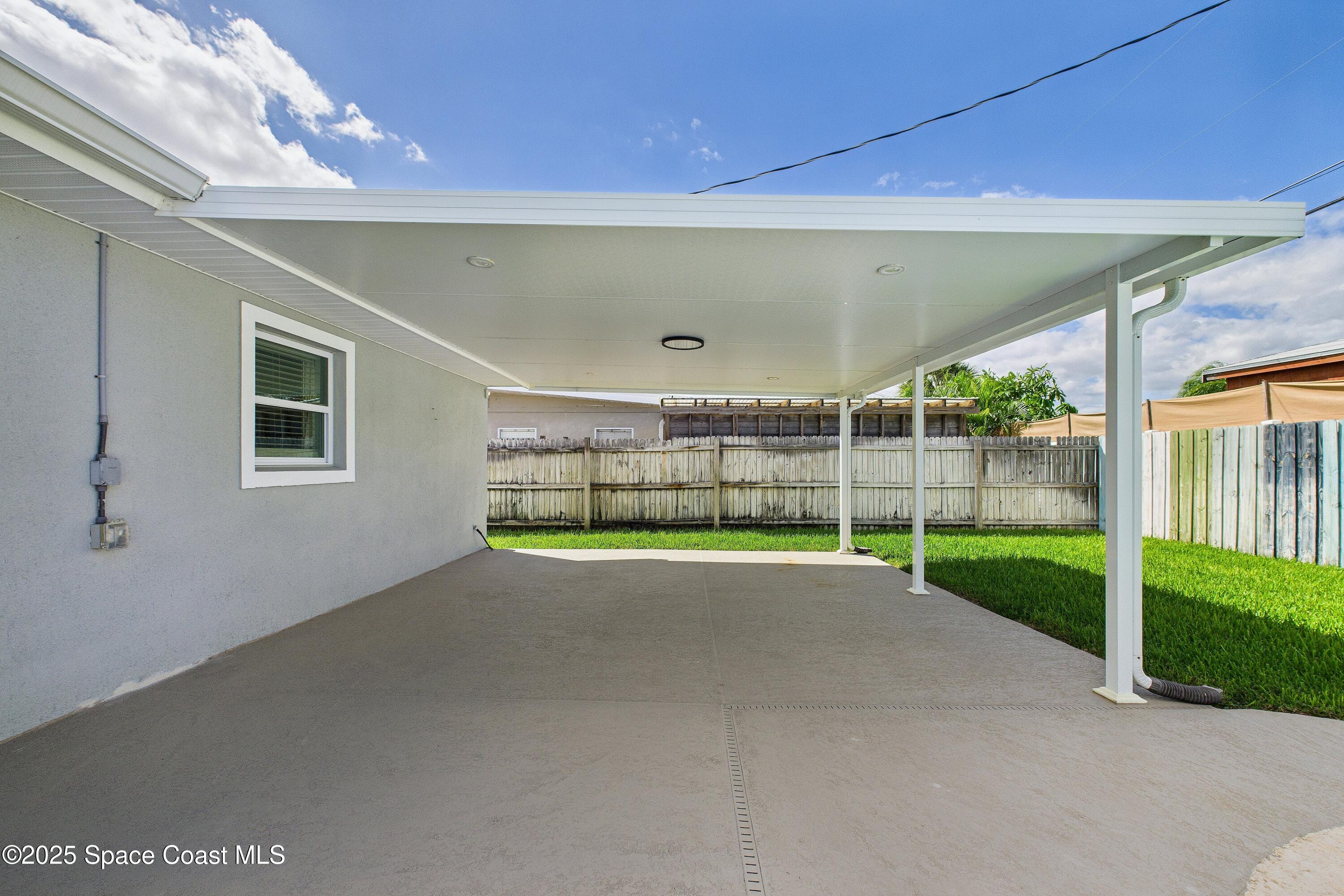 1500 Dorsal Street Merritt Island, FL 32952 - Photo 49 of 56 a view of a backyard