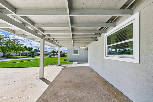 a view of a porch with a yard