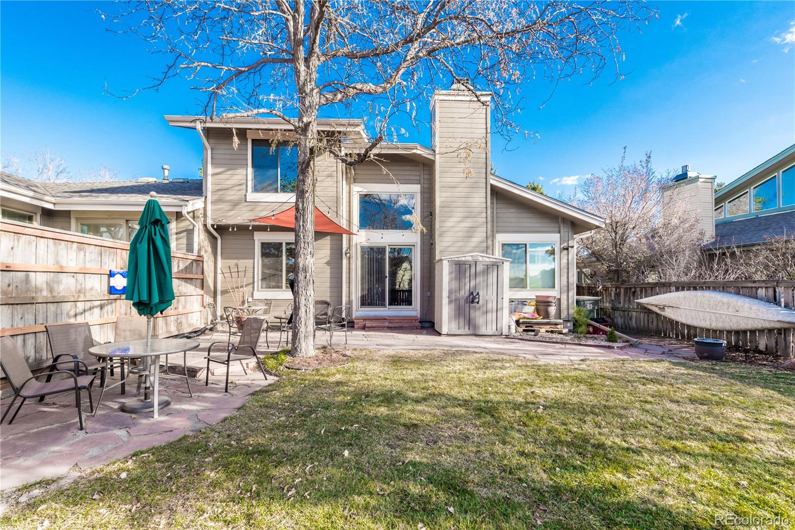 8583 Redstone Street Highlands Ranch, CO 80126 - Photo 22 of 25 a view of a chair with tables in patio