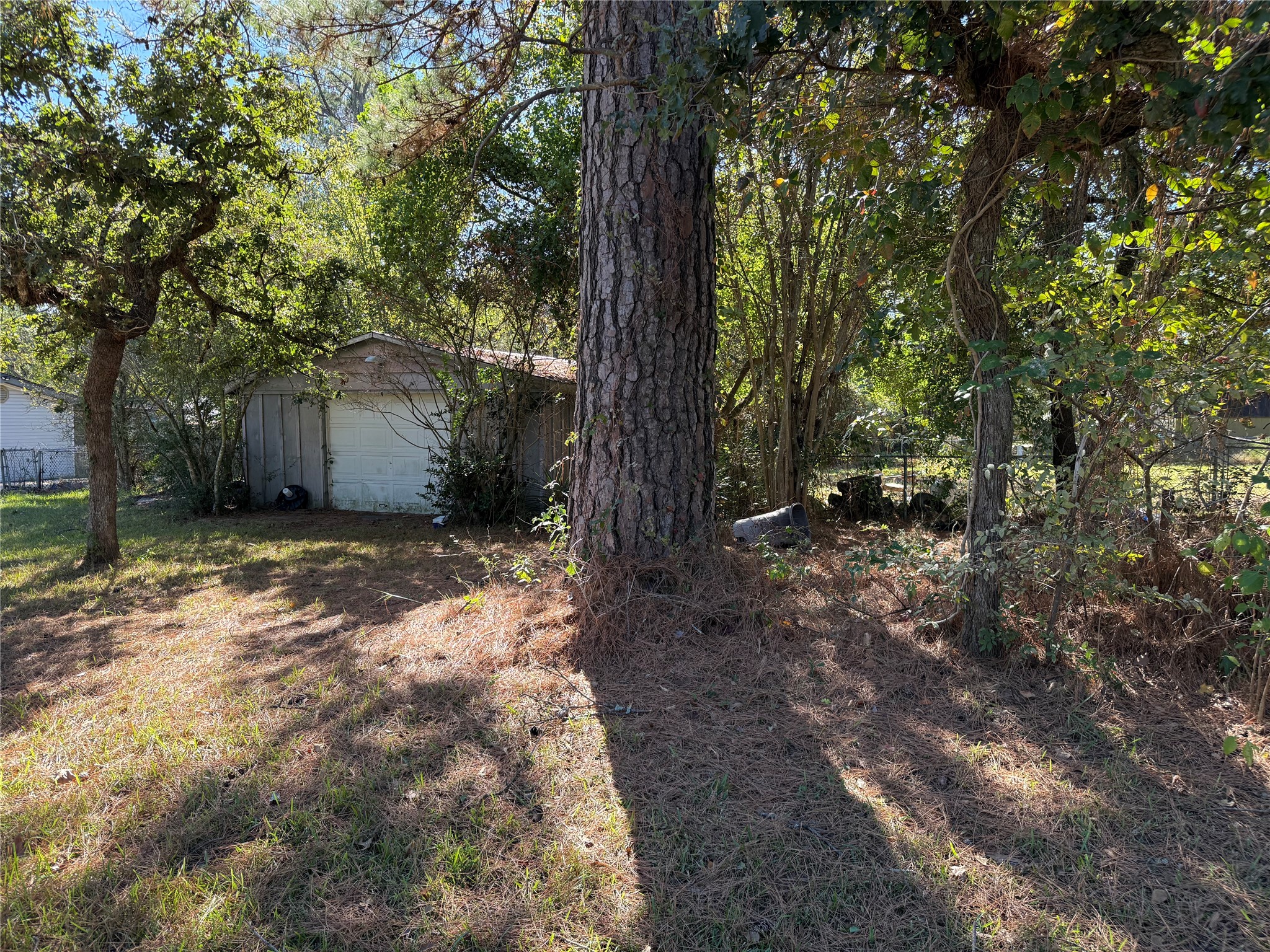 Lot 1 Easy Street Magnolia, TX 77355 - Photo 5 of 9 a backyard of a house with lots of green space