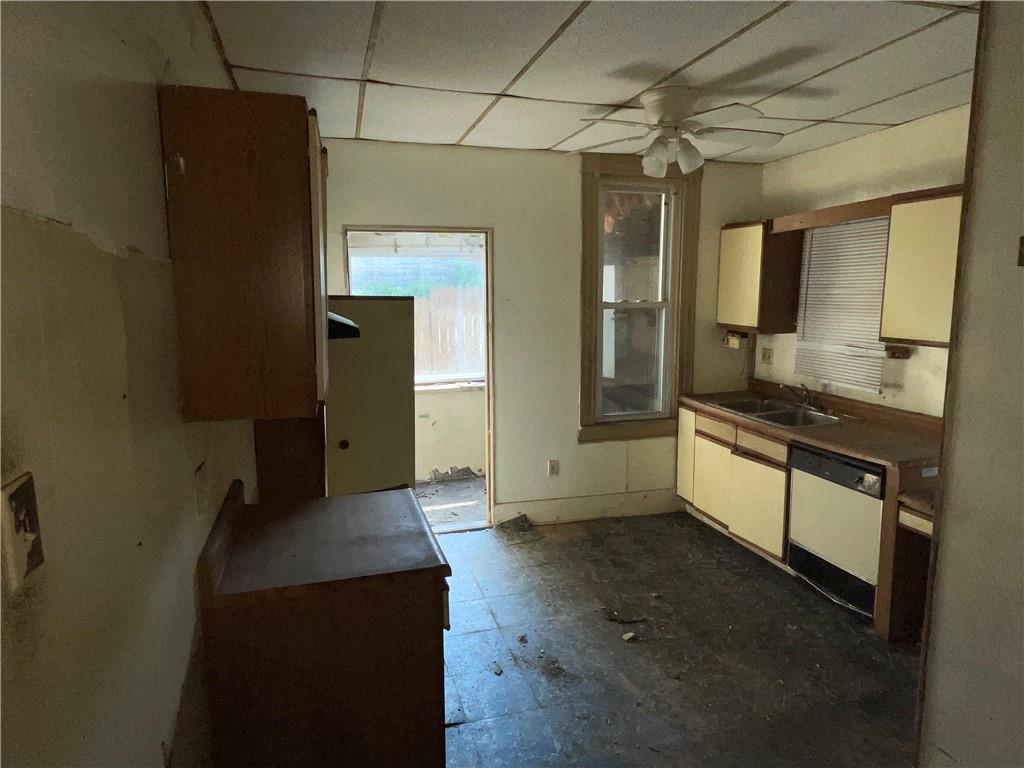 124 East 15th Avenue Homestead, PA 15120 - Photo 4 of 15 a view of a refrigerator in a kitchen
