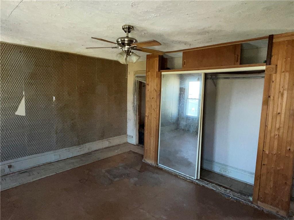 124 East 15th Avenue Homestead, PA 15120 - Photo 10 of 15 a view of a room with a ceiling fan
