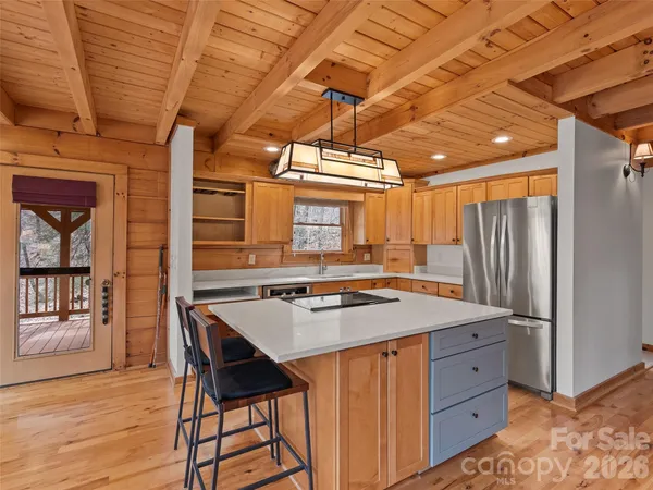 a kitchen that has a cabinets and a stove