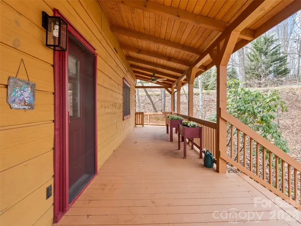 a view of a porch with furniture