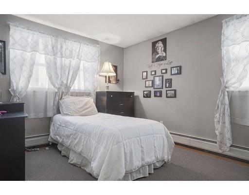 40 Sunflower Road Holbrook, MA 02343 - Photo 13 of 26 a bedroom with a bed and a window