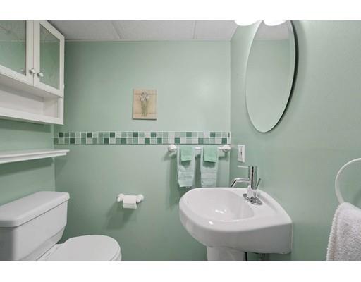 40 Sunflower Road Holbrook, MA 02343 - Photo 20 of 26 a bathroom with a sink mirror and toilet