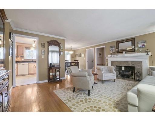 40 Sunflower Road Holbrook, MA 02343 - Photo 3 of 26 a living room with furniture and a fireplace