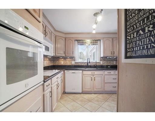 40 Sunflower Road Holbrook, MA 02343 - Photo 5 of 26 a kitchen with granite countertop a sink and cabinets