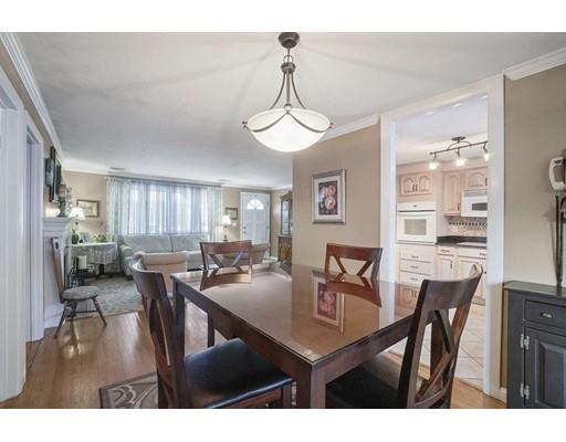 40 Sunflower Road Holbrook, MA 02343 - Photo 7 of 26 a view of a dining room with furniture and wooden floor