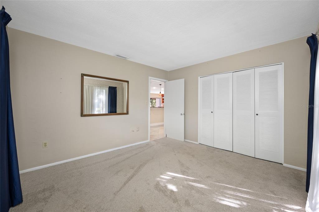 5473 97th Way North St. Petersburg, FL 33708 - Photo 37 of 62 a view of an empty room with windows