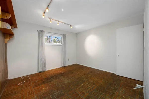 an empty room with windows