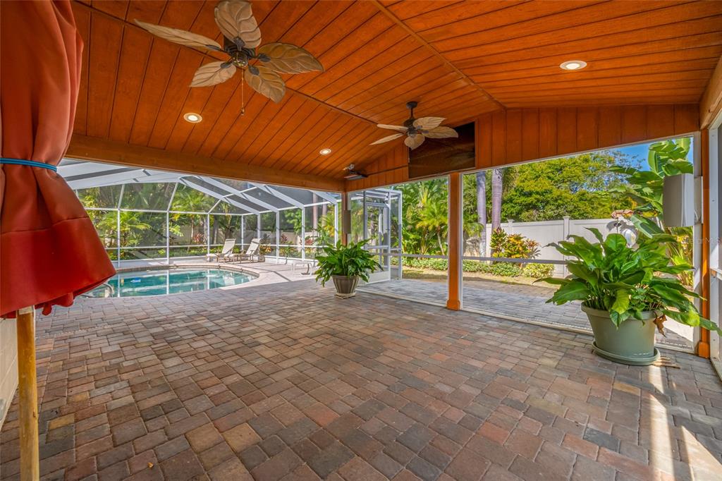5473 97th Way North St. Petersburg, FL 33708 - Photo 46 of 57 a view of a porch with potted plants