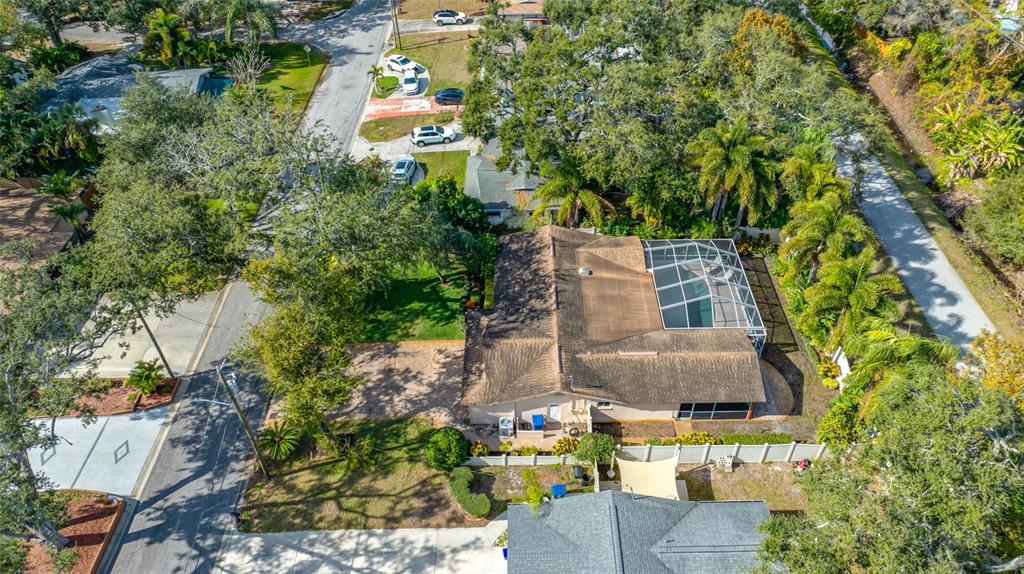 5473 97th Way North St. Petersburg, FL 33708 - Photo 53 of 57 an aerial view of residential houses with outdoor space