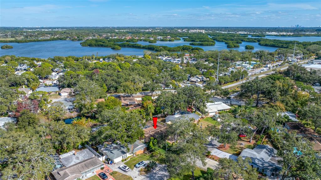 5473 97th Way North St. Petersburg, FL 33708 - Photo 54 of 57 an aerial view of residential houses with outdoor space and trees