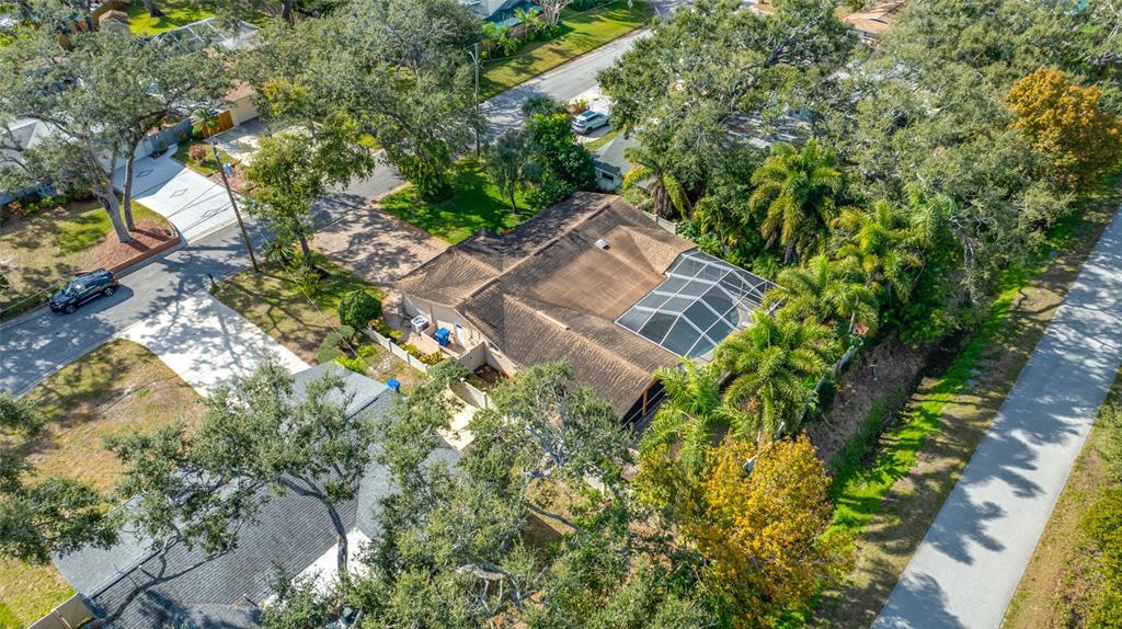 5473 97th Way North St. Petersburg, FL 33708 - Photo 57 of 57 an aerial view of a house with a yard