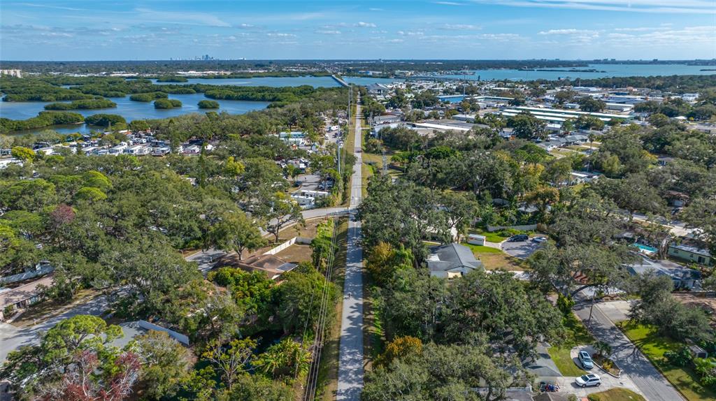 5473 97th Way North St. Petersburg, FL 33708 - Photo 57 of 62 an aerial view of residential building and lake