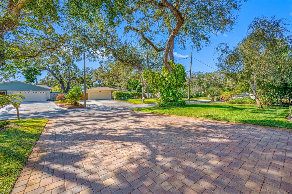 5473 97th Way North St. Petersburg, FL 33708 - Photo 6 of 57 a view of a park with large trees