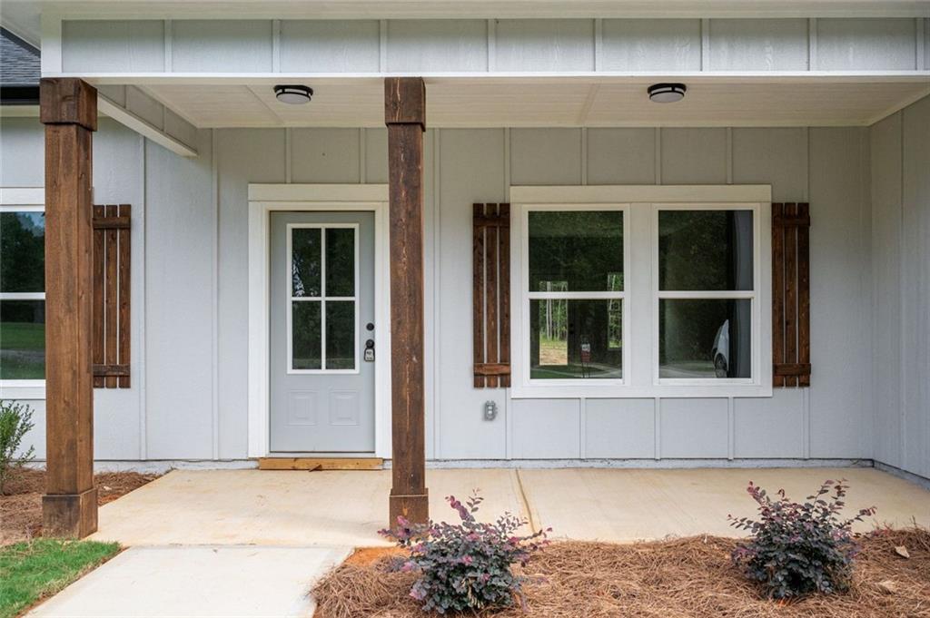 512 Branch Street Cedartown, GA 30125 - Photo 6 of 36 a front view of a house with a yard