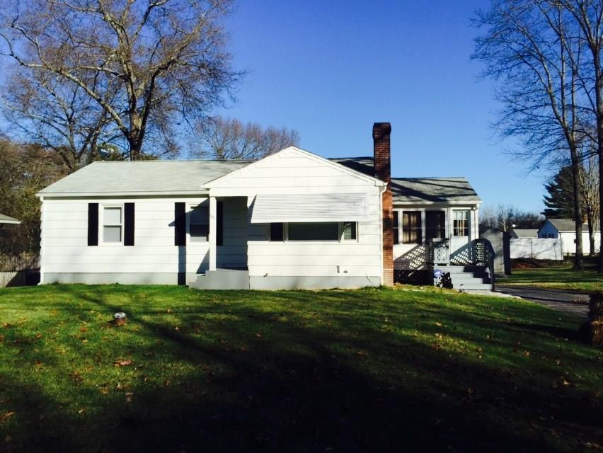 185 Sand Dam Road Thompson, CT 06277 - Photo 1 of 1 a front view of a house with a garden