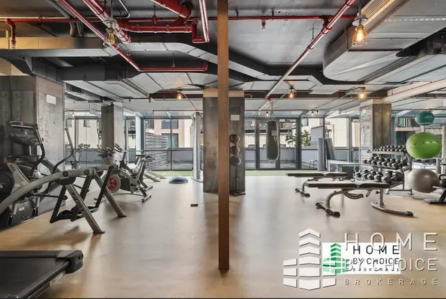 a view of swimming pool with outdoor seating