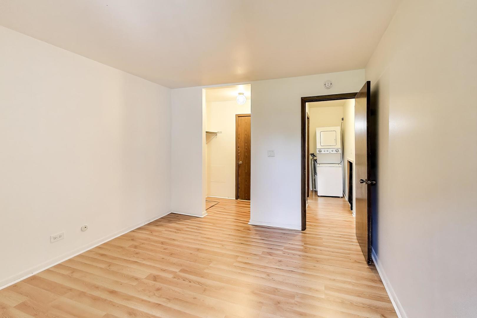 691 Wakefield Road, Unit 691 Gurnee, IL 60031 - Photo 12 of 26 a view of hallway with wooden floor