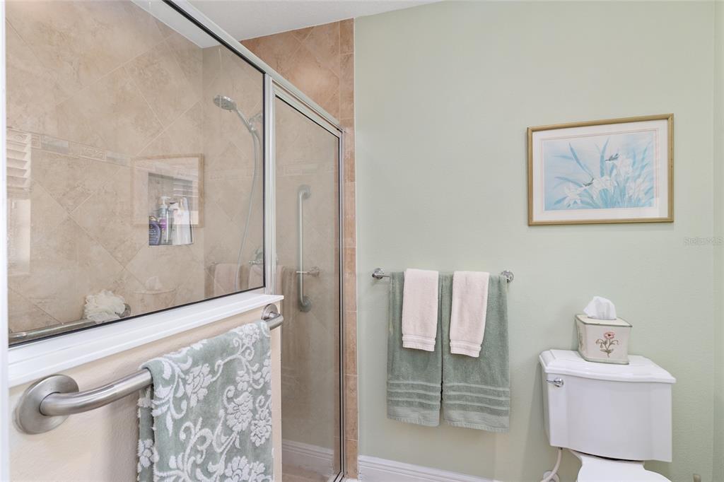 2053 Beecher Path The Villages, FL 32162 - Photo 29 of 44 a bathroom with a sink and a mirror