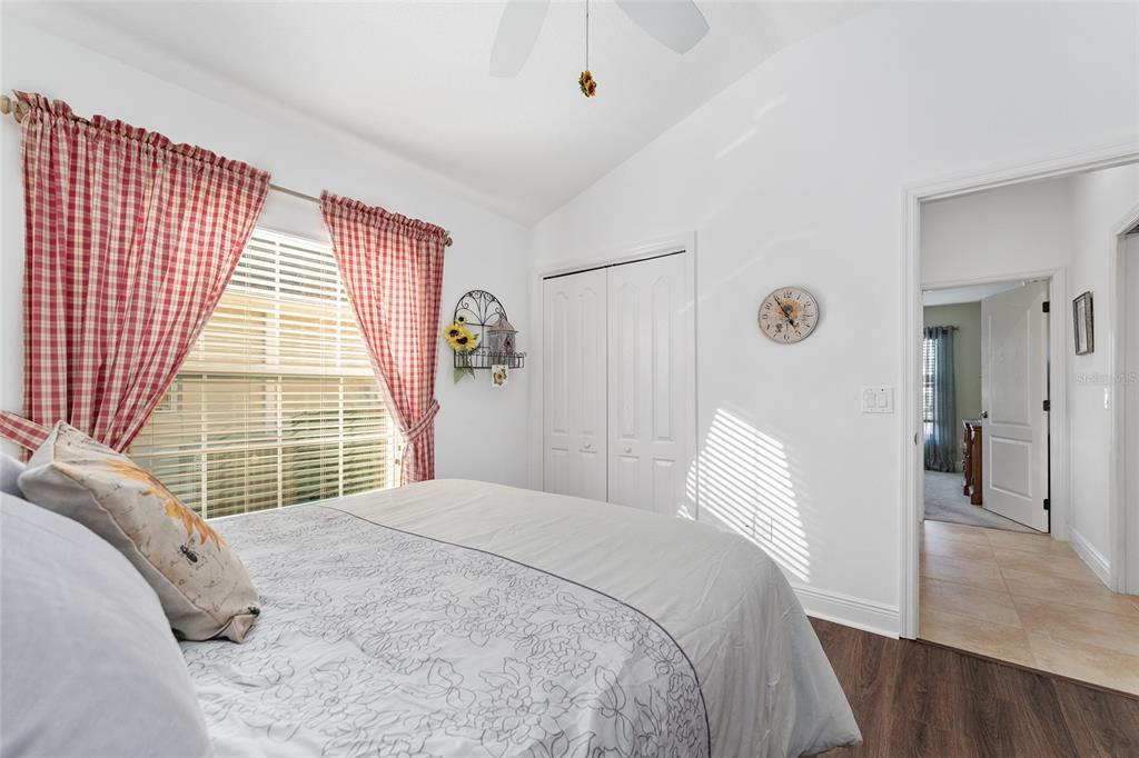 2053 Beecher Path The Villages, FL 32162 - Photo 35 of 44 a bedroom with a bed and a large window