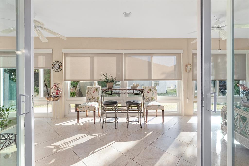 2053 Beecher Path The Villages, FL 32162 - Photo 37 of 44 a dining room with furniture
