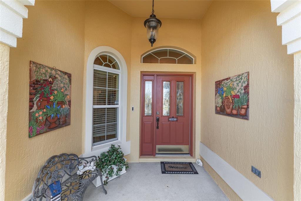 2053 Beecher Path The Villages, FL 32162 - Photo 6 of 44 a view of a entryway door of the house