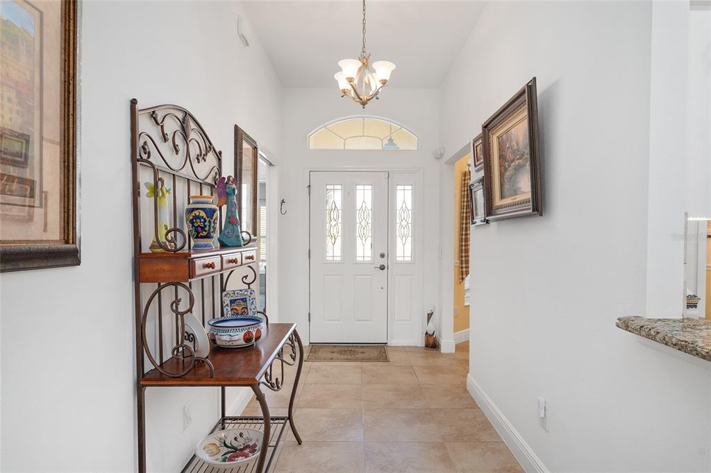 2053 Beecher Path The Villages, FL 32162 - Photo 8 of 44 a view of a hallway with a livingroom