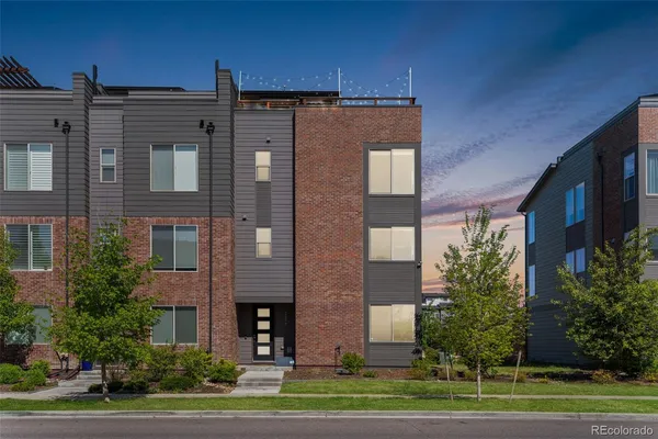 a view of a building with a yard