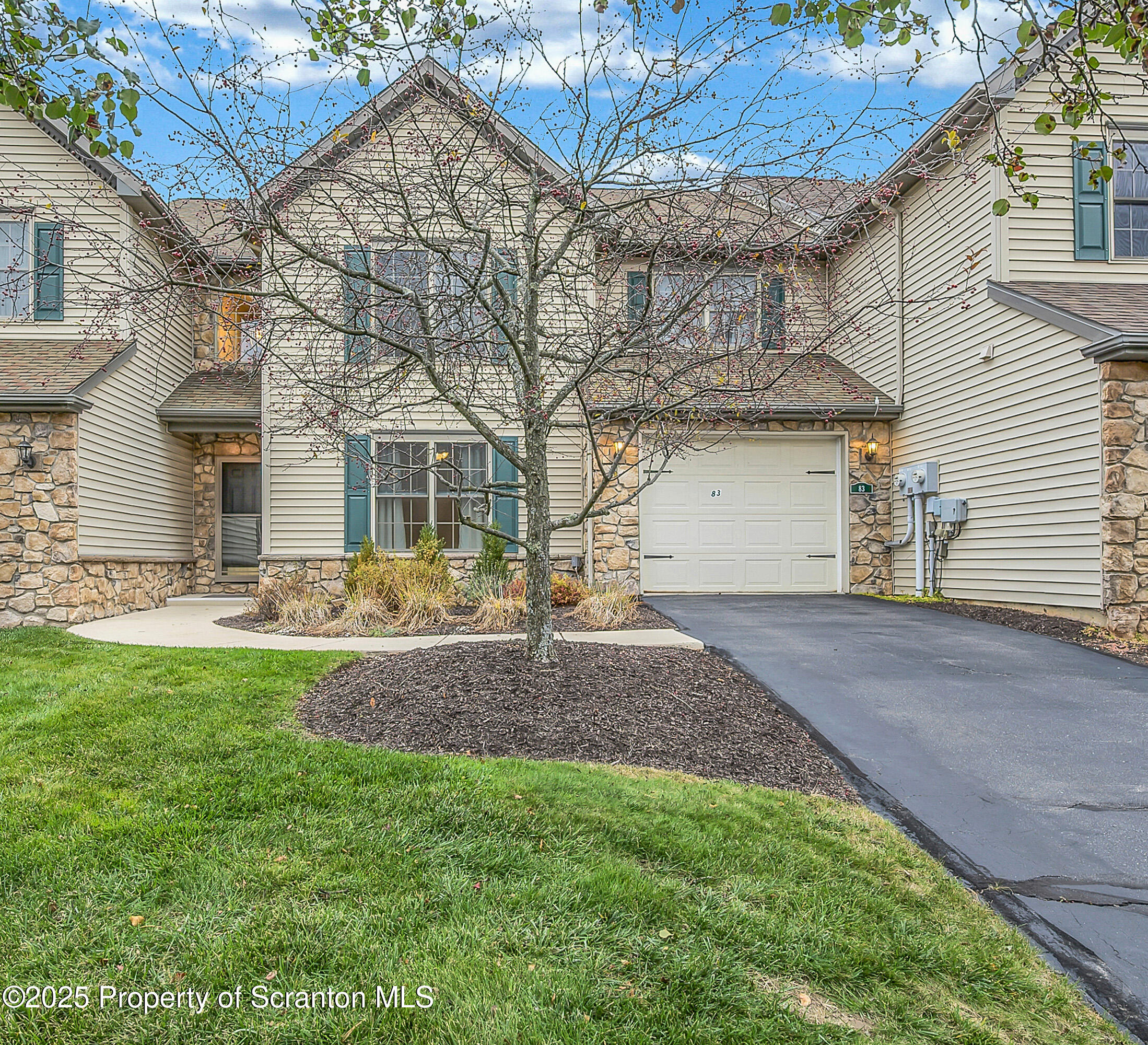 83 Hedge Row Run Clarks Summit, PA 18411 - Photo 1 of 49 a front view of house with yard