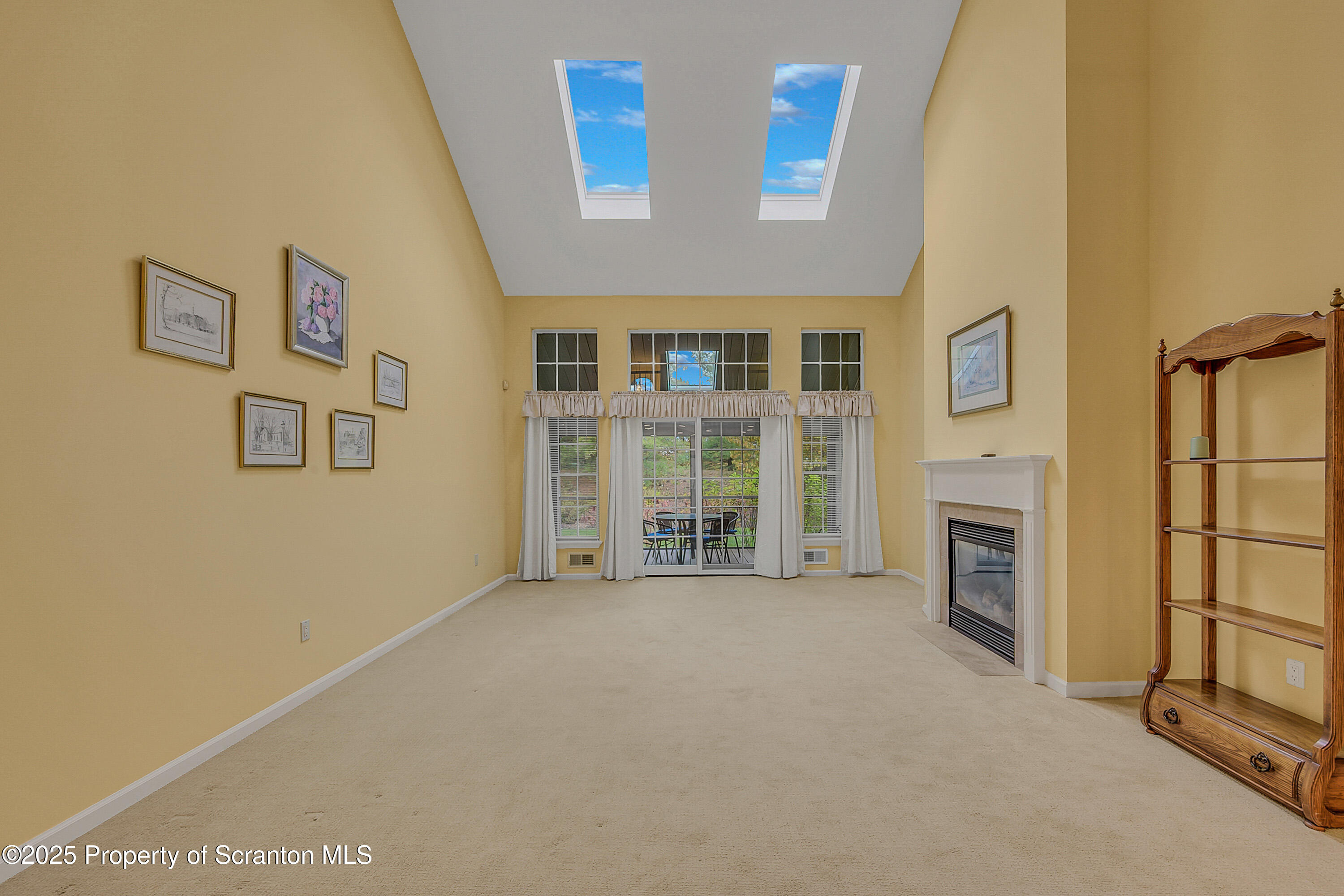 83 Hedge Row Run Clarks Summit, PA 18411 - Photo 14 of 49 a view of an empty room with a fireplace