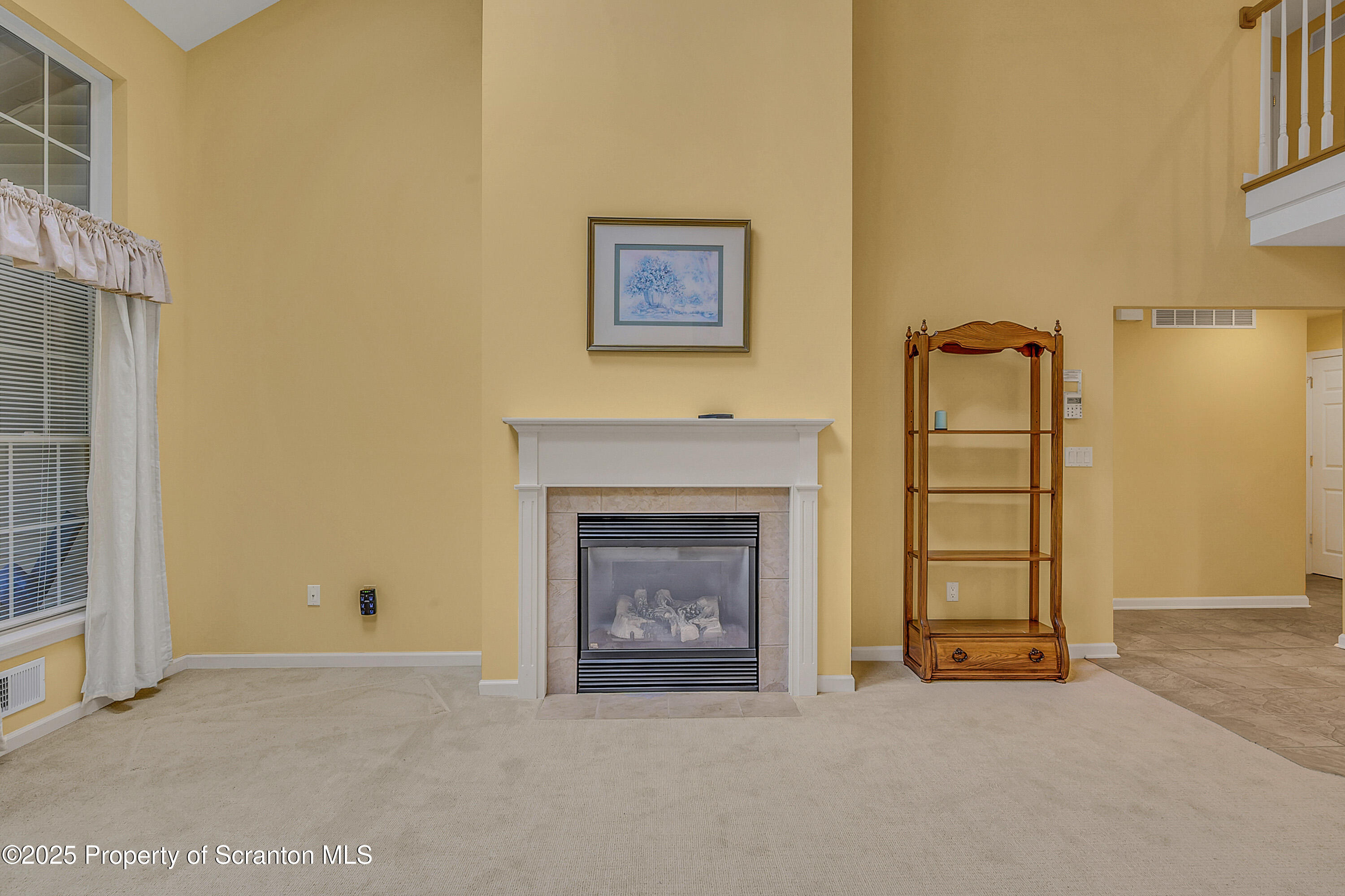 83 Hedge Row Run Clarks Summit, PA 18411 - Photo 15 of 49 a view of an empty room with a fireplace